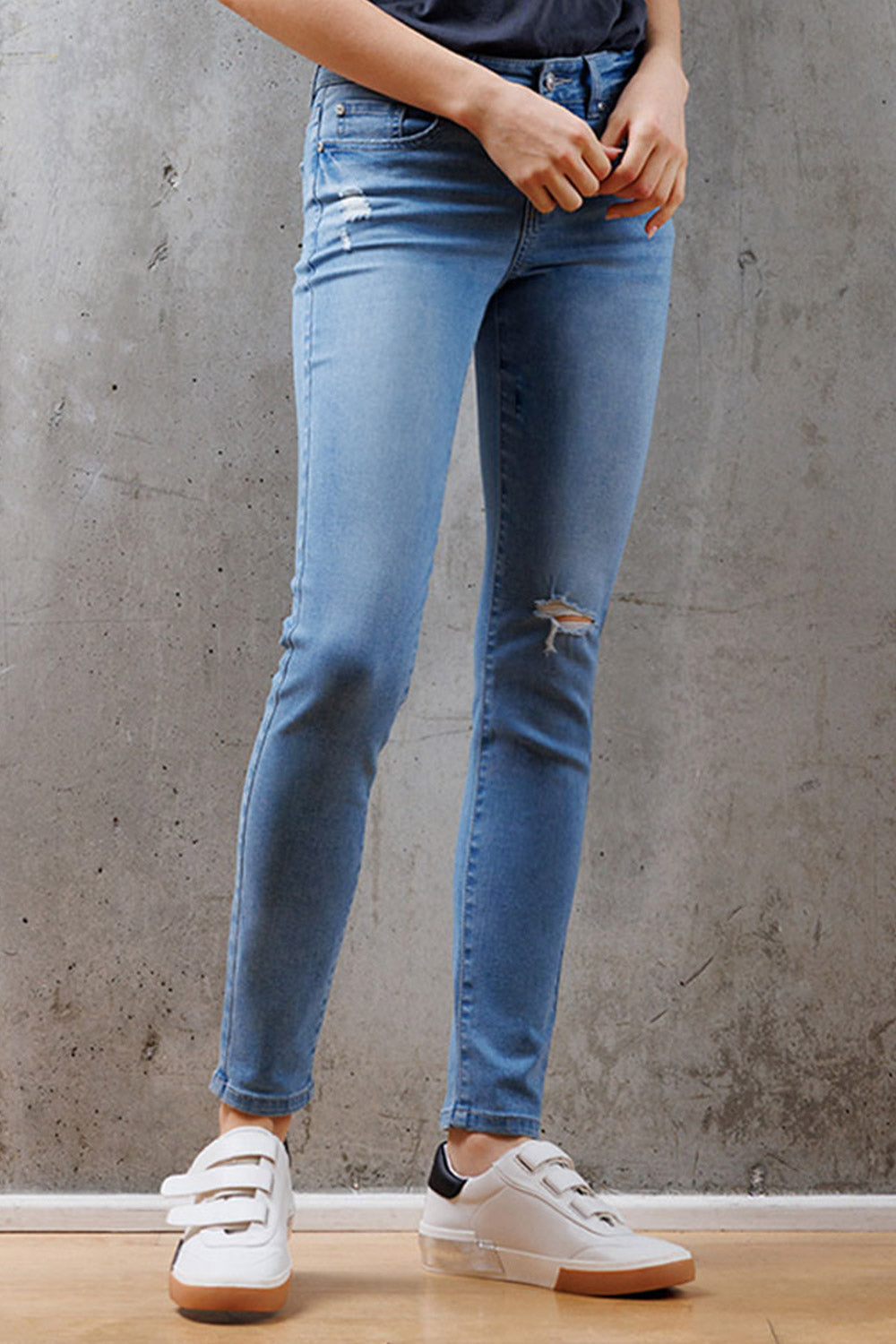 Mid Rise Destructed Skinny Jeans