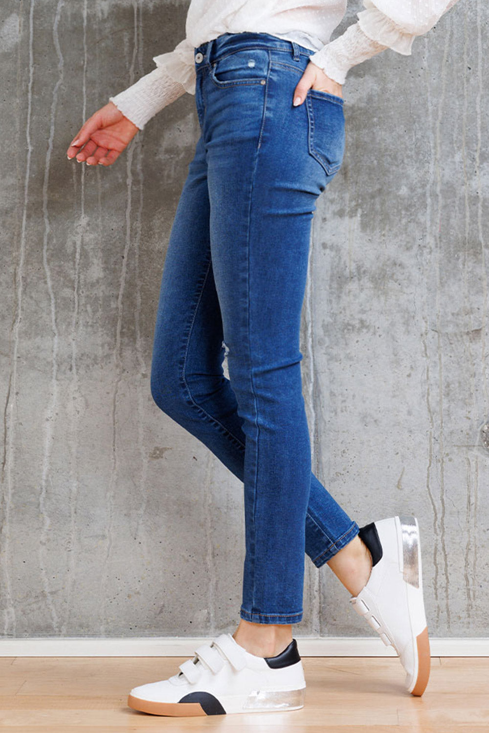 Mid Rise Destructed Skinny Jeans