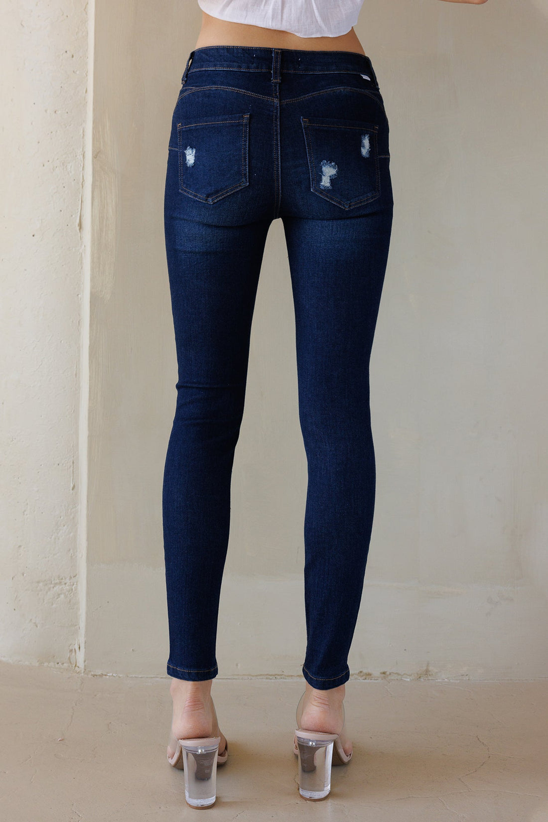 Mid Rise Destructed Skinny Jeans