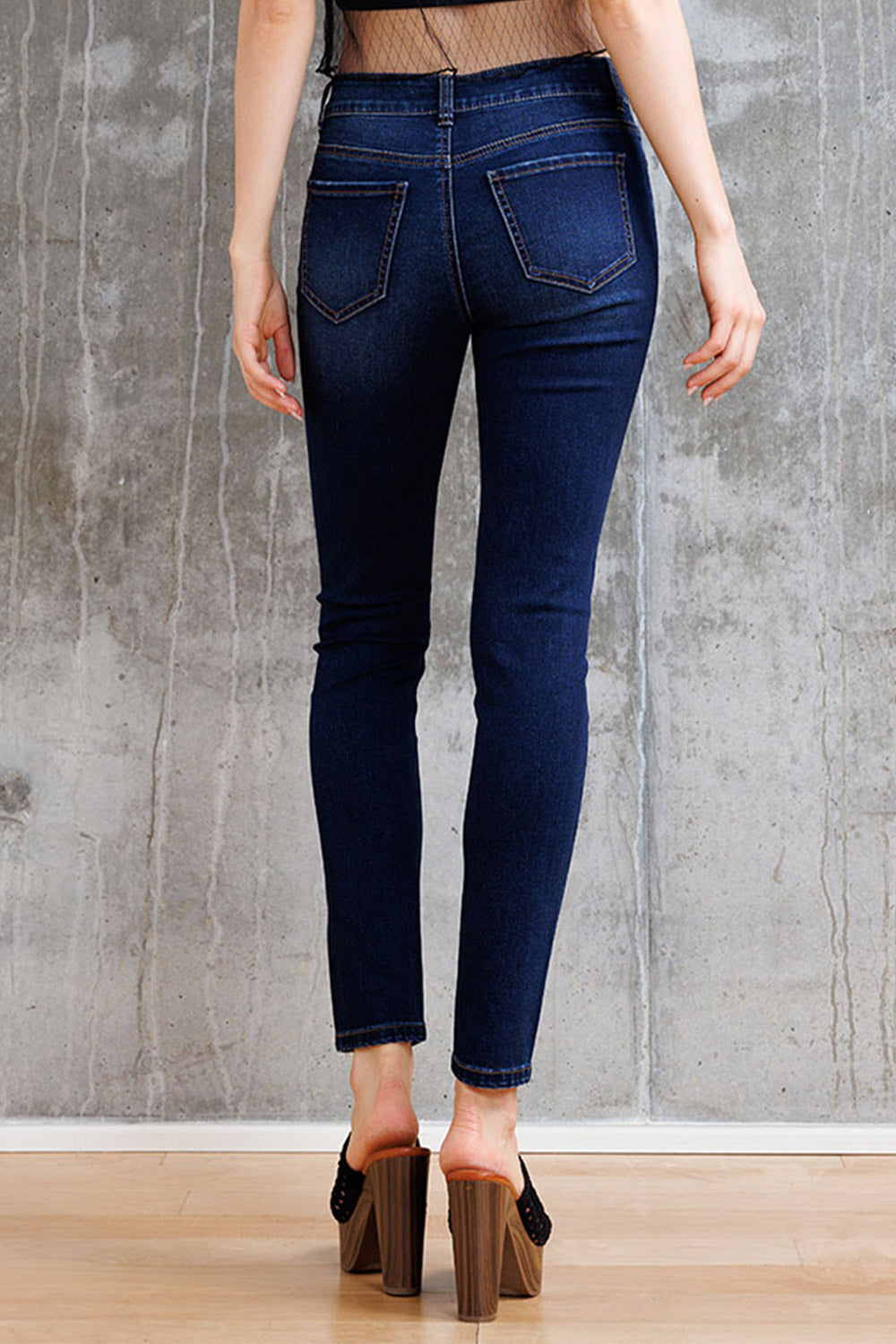 Mid Rise Destructed Skinny Jeans