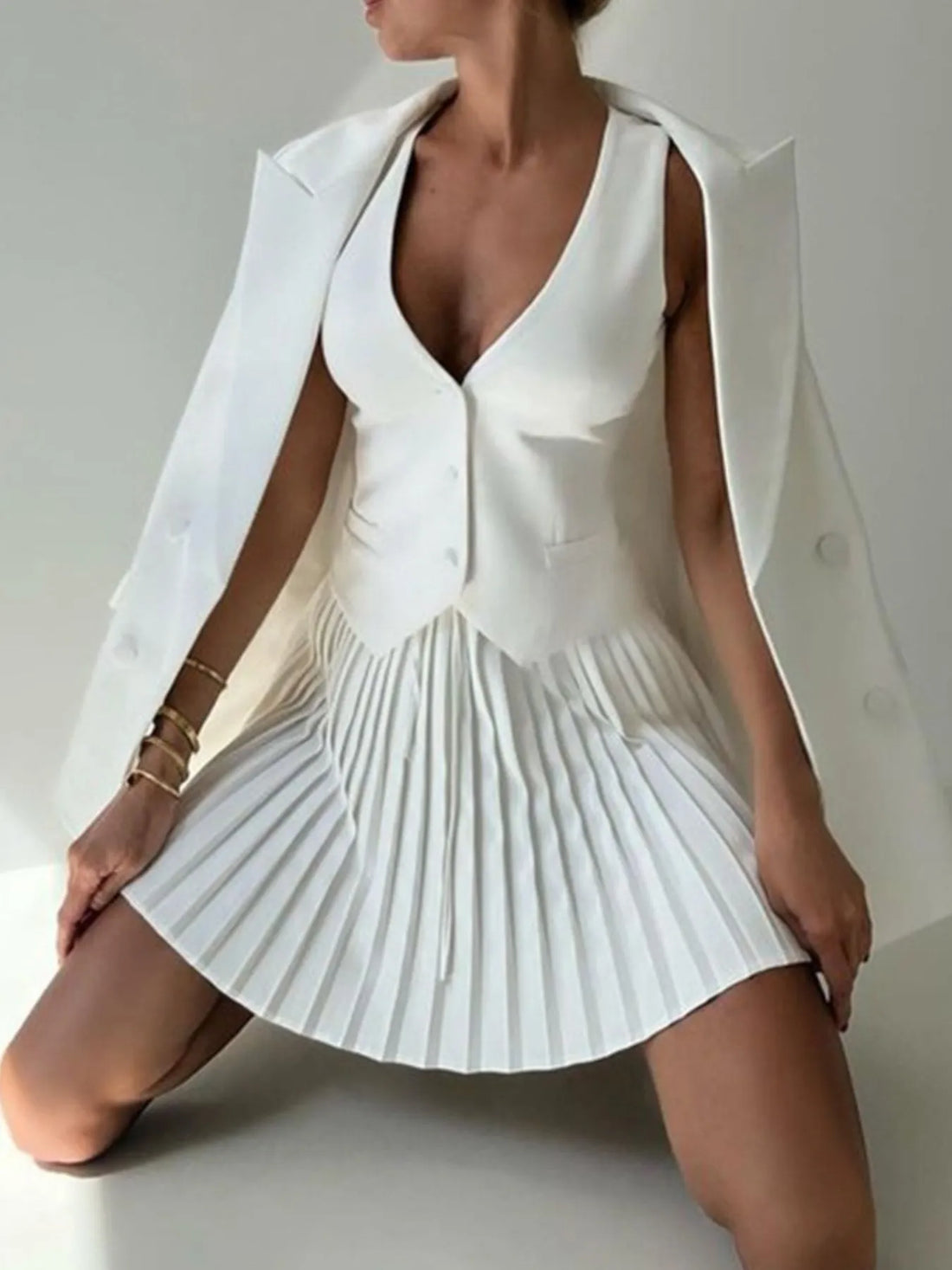 Button Up Vest and Pleated Mini Skirt Set See size chart under “more details”